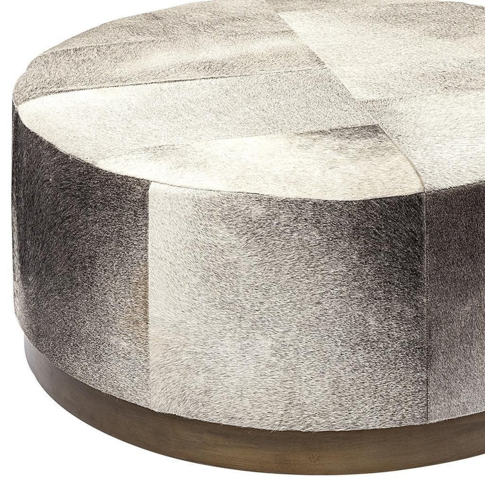 Cropped view of 36" Gray Wool And Brown Footstool Ottoman focusing on the gray wool surface.