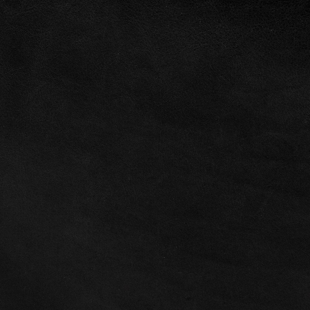 36" Black Faux Leather and Brown Footstool photographed against a dark studio background in black.