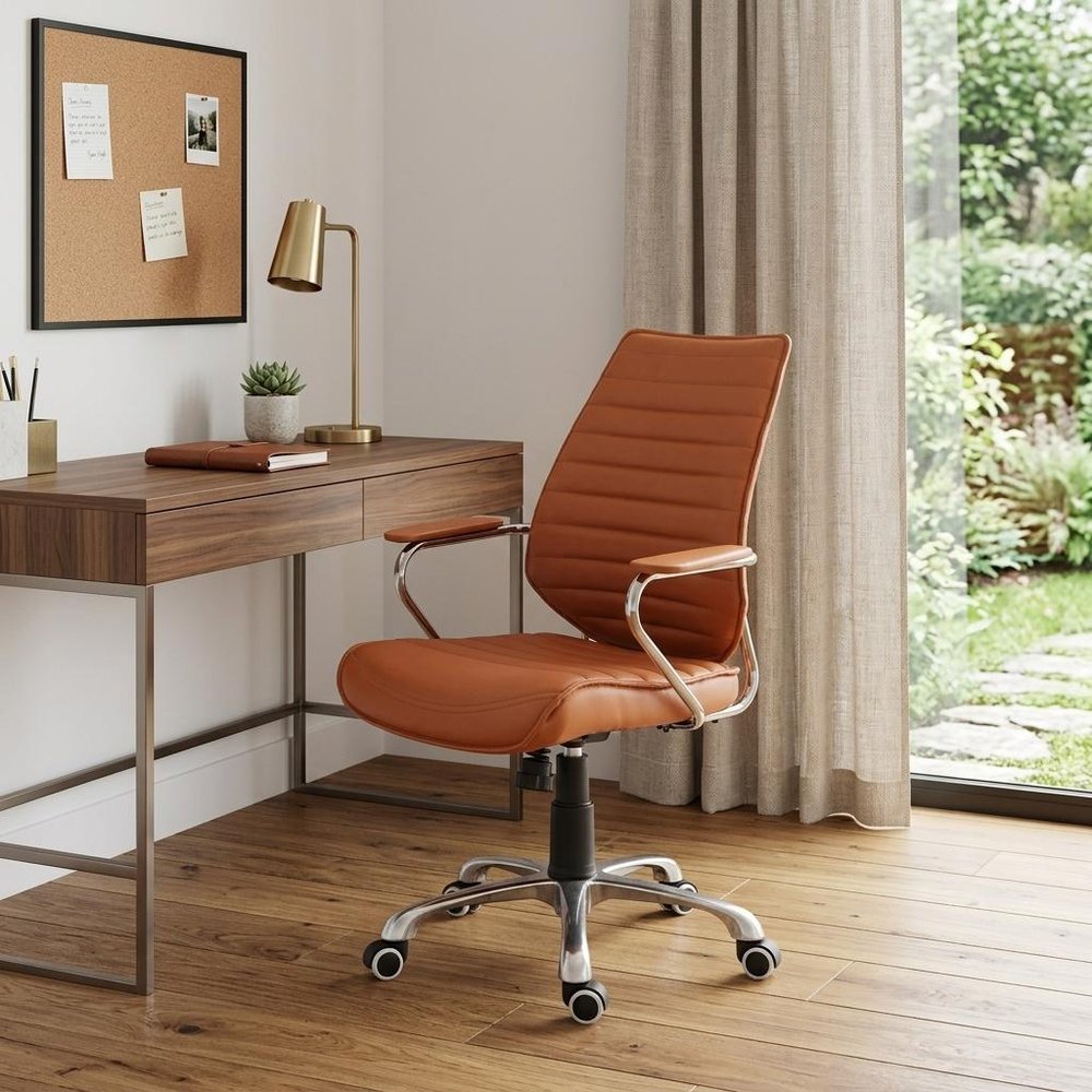 Orange and Silver Adjustable Swivel Faux Leather Rolling Executive Office Chair in a home interior