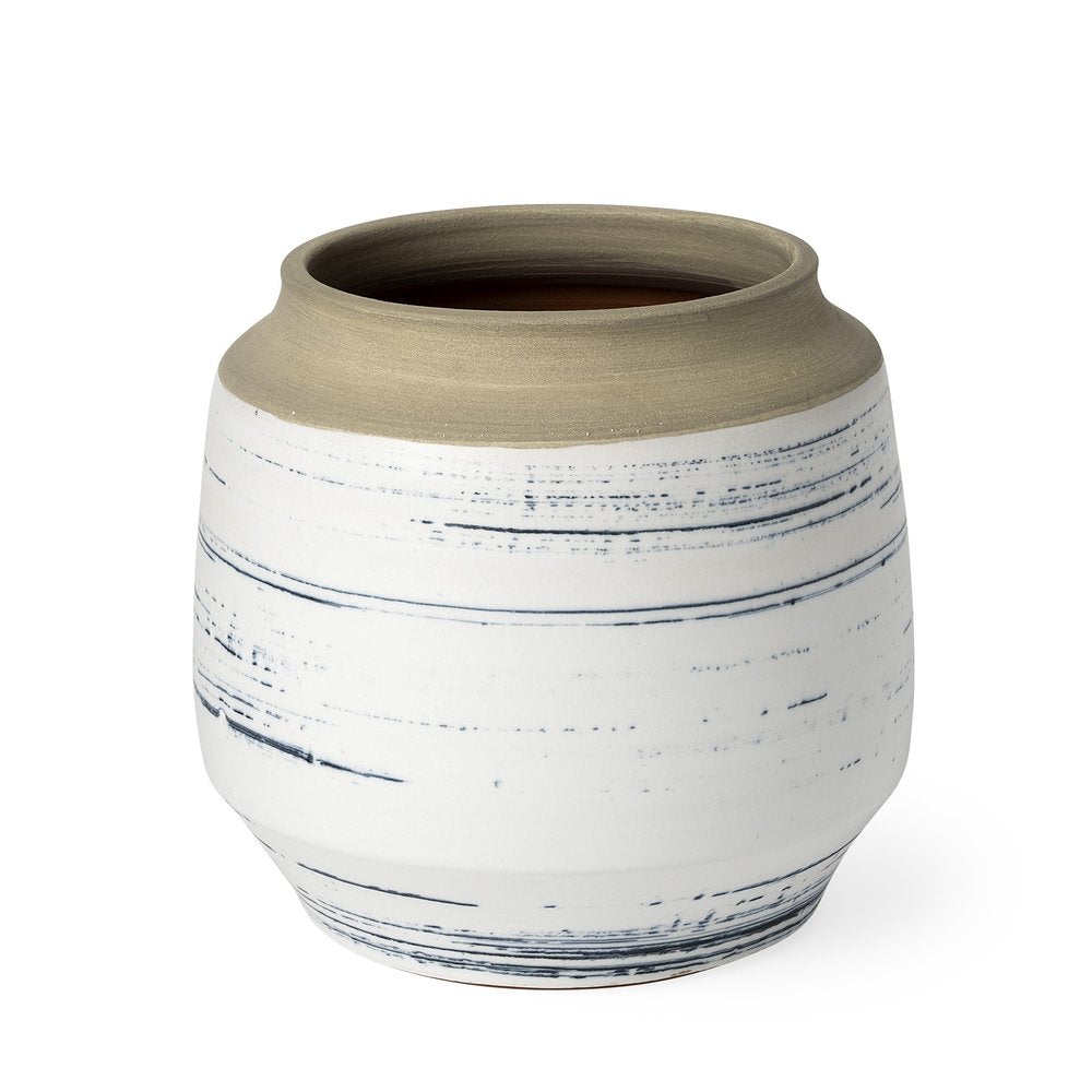 White and blue abstract ceramic vase with a sand-colored rim on a white background.