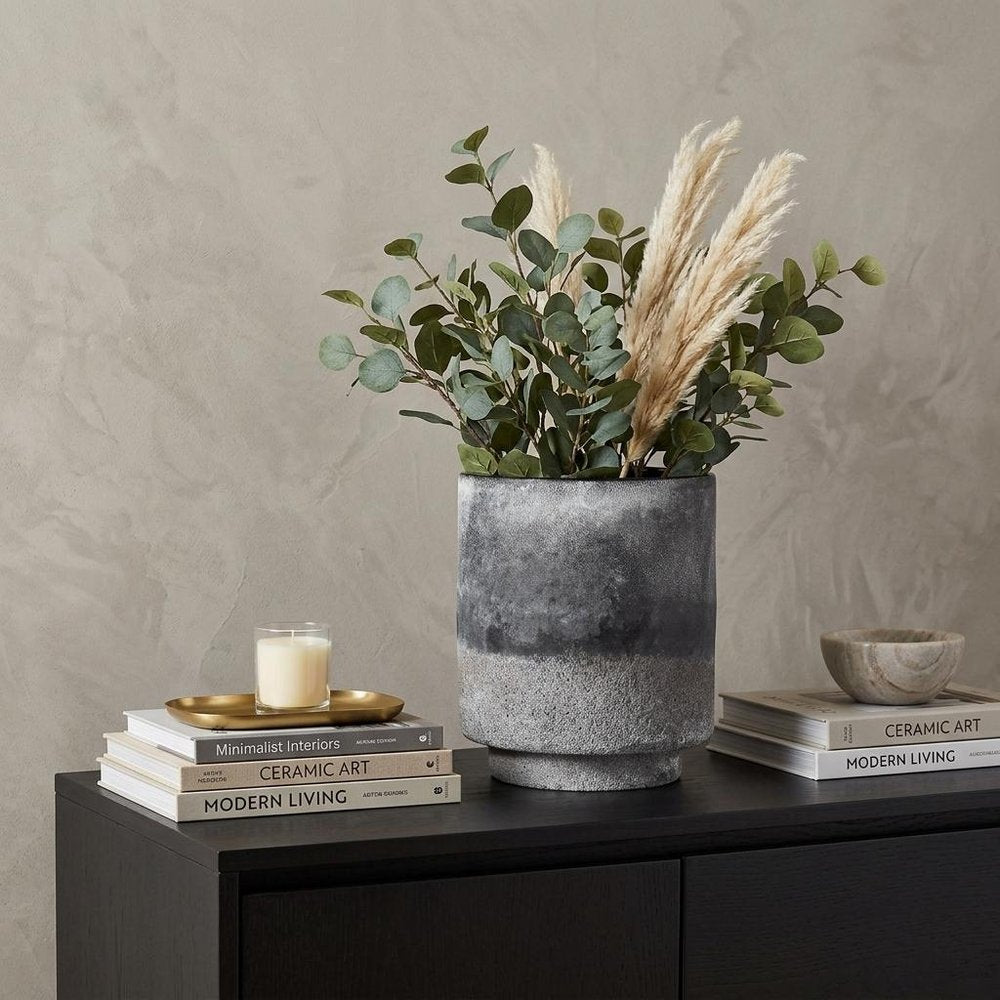 9" Brown And Black Abstract Cylinder Ceramic Table Vase in a home interior