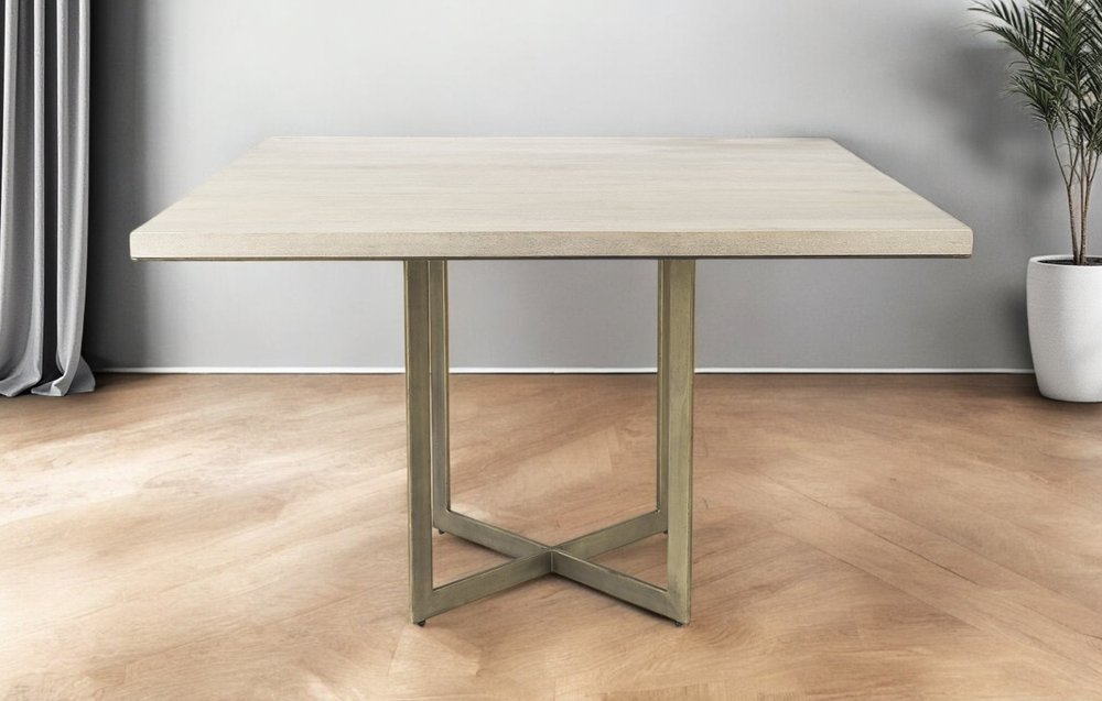 Modern Square Wood and Gold Dining Table in a home interior