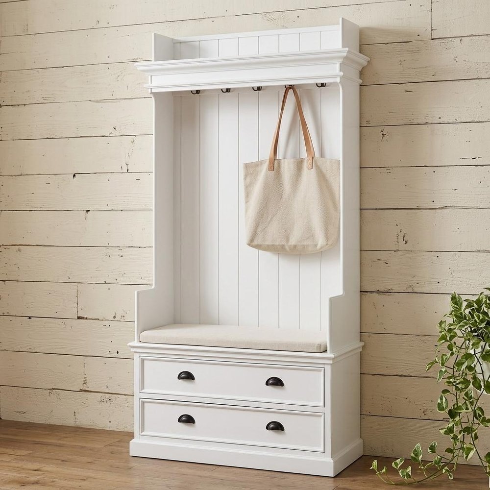 Classic White Entryway Coat Rack and Bench with Drawers in a home interior