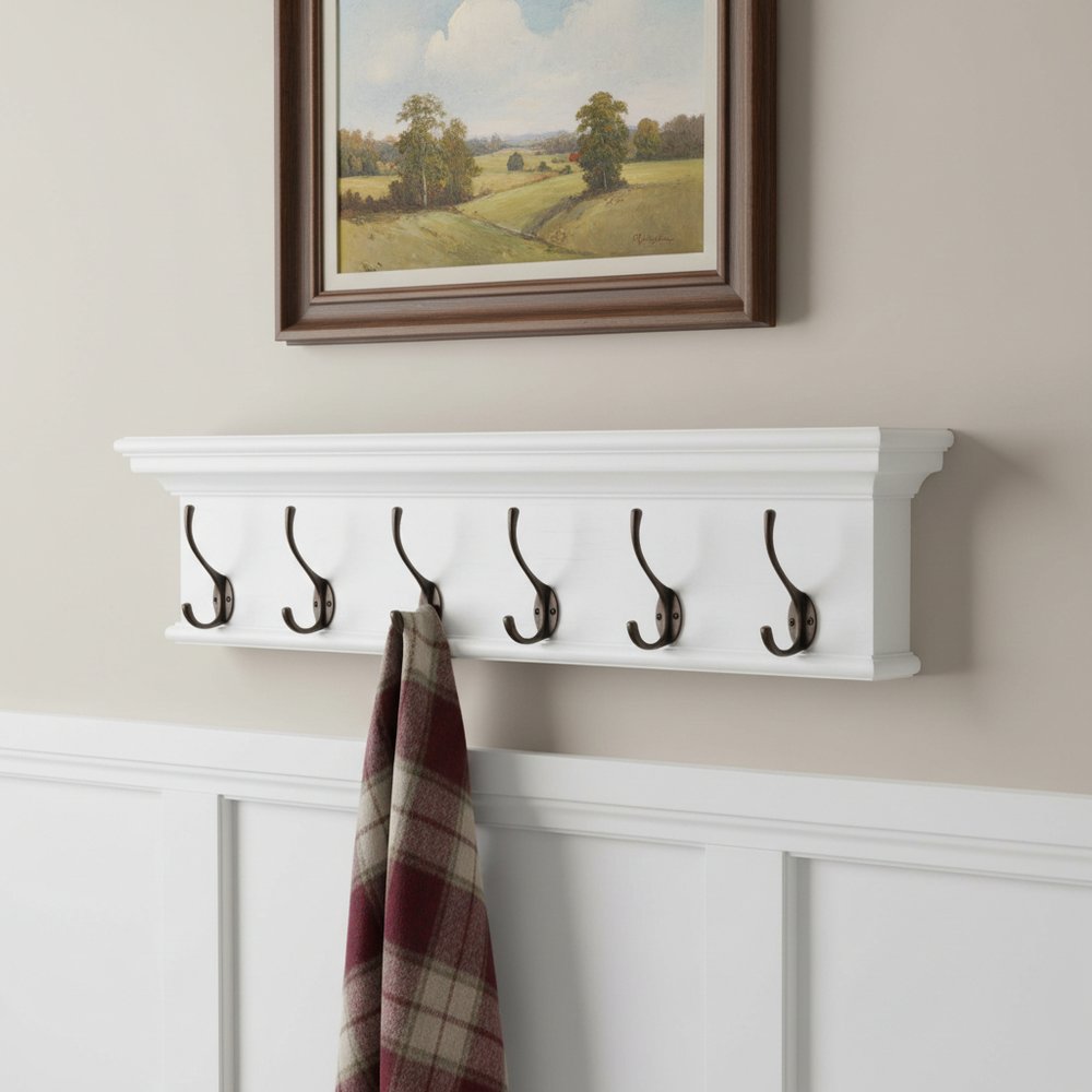 39" Classic White Wood Six Hook Hanging Coat Rack. Coat hanger isolated on a plain white background, finished in white wood.