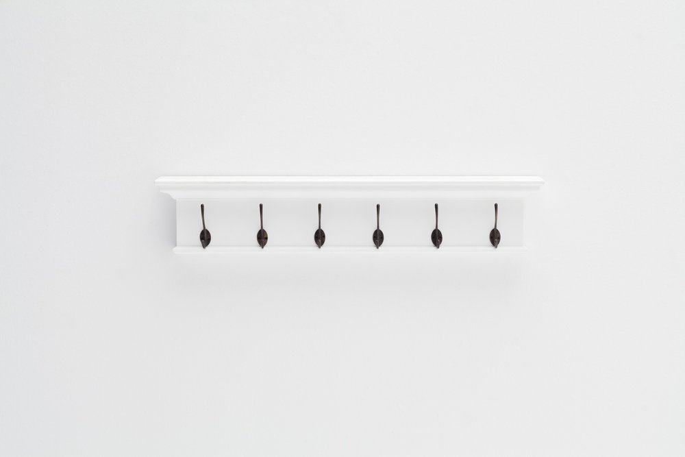 39" Classic White Wood Six Hook Hanging Coat Rack. Coat hanger isolated on a plain white background, showing a white wood surface.