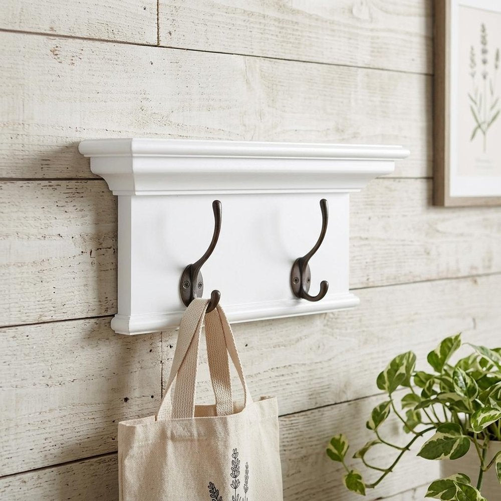 Classic White Two Hook Hanging Coat Rack in a home interior