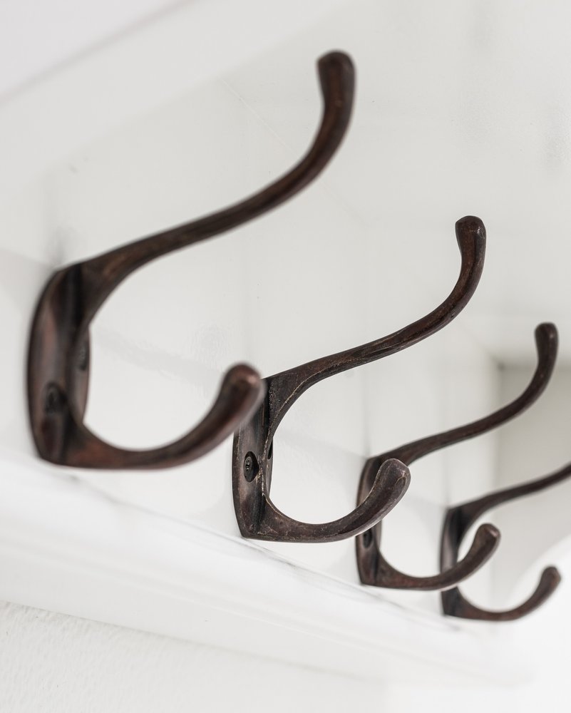 Classic White Wood Wide Four Hook Hanging Coat Rack on a white background