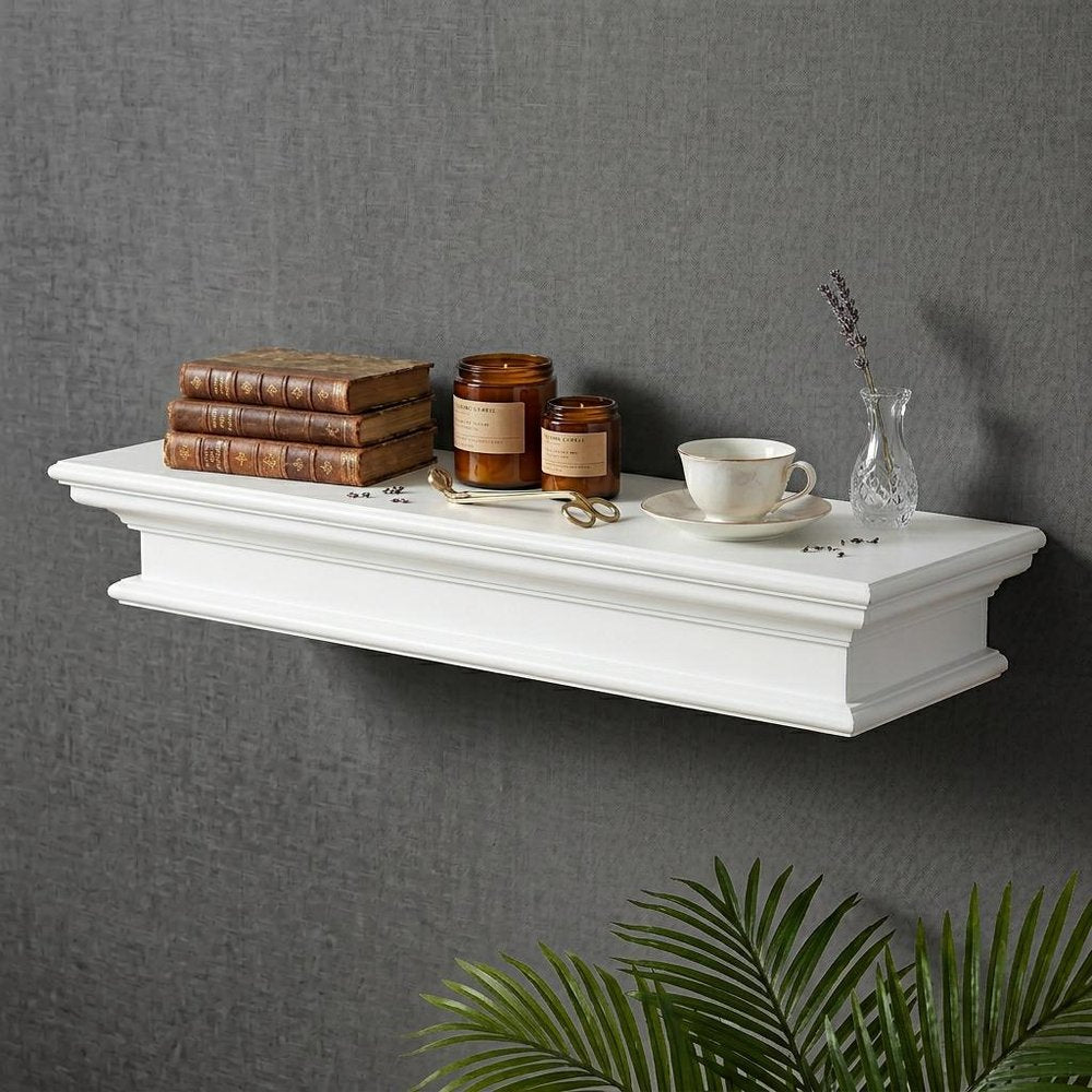 32" Classic White Floating Wall Shelf styled in a furnished interior with a gray wall on a charcoal floor.