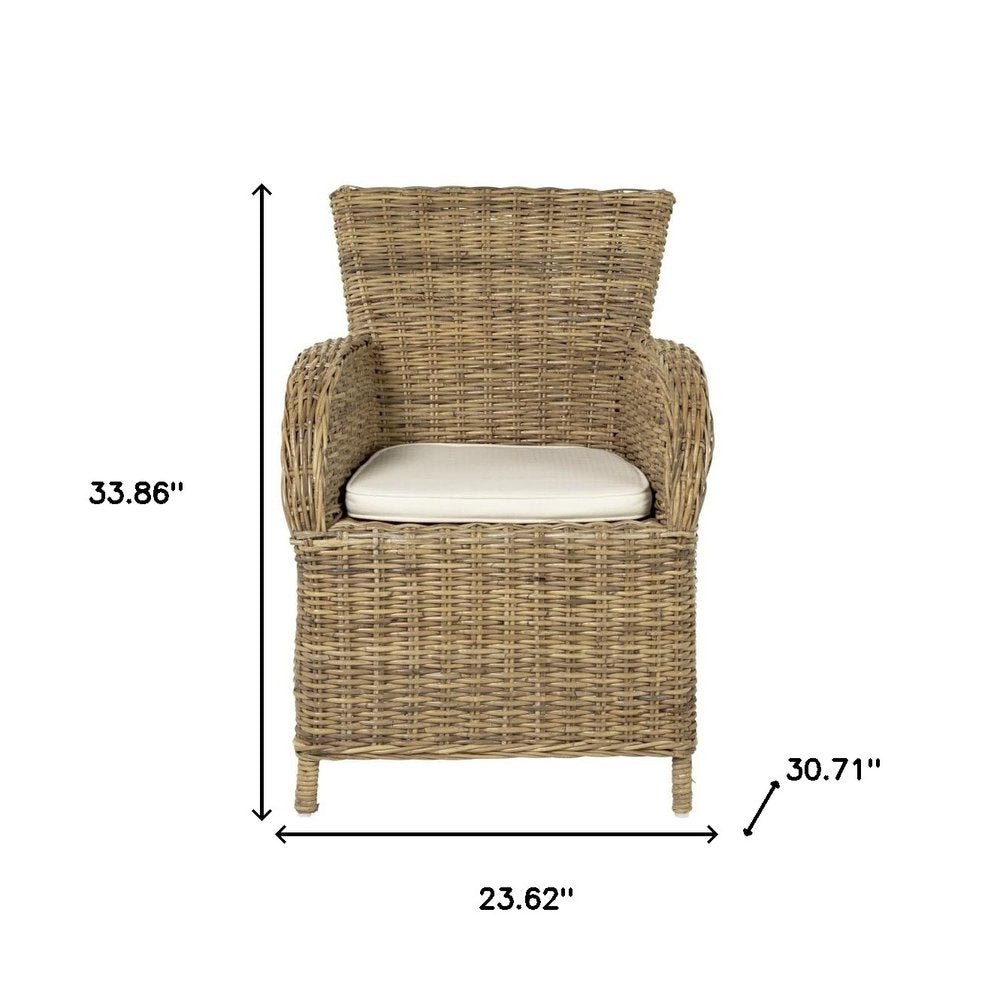 Set of Two Tan Textured Outdoor Dining Chairs with Beige Cushions on a white background