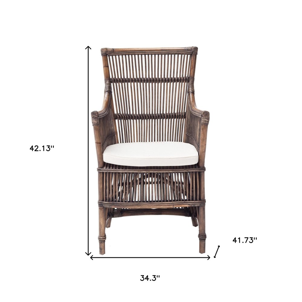 Set of Two Cream Rattan Outdoor Arm Chairs on a white background