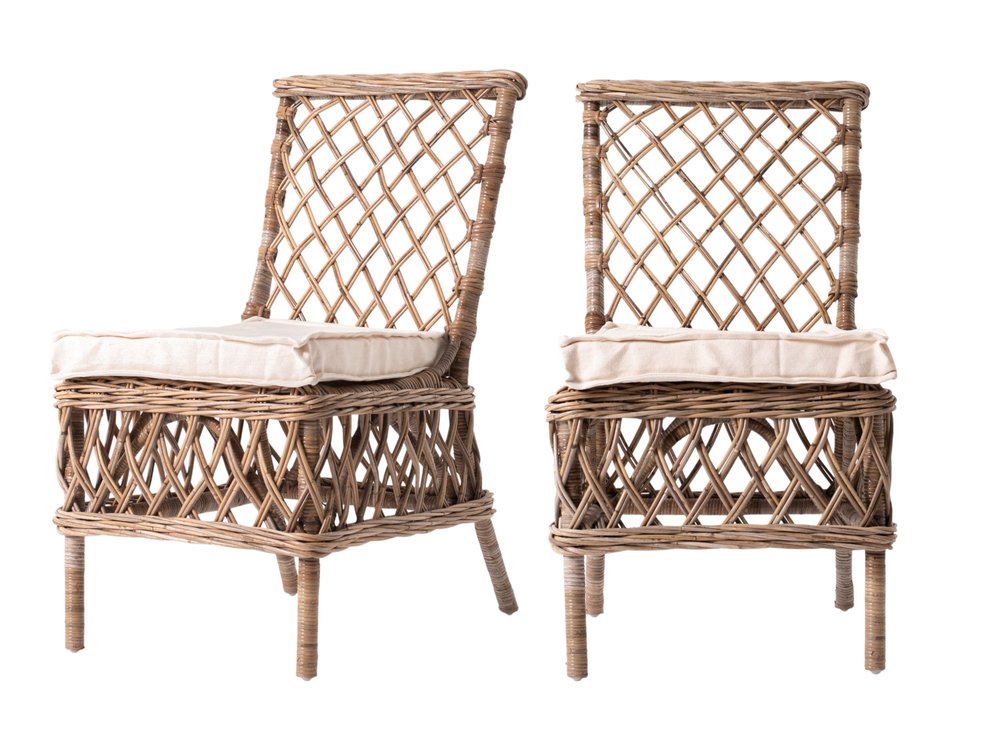Set of Two Cream Woven Rattan Outdoor Accent Chairs on a white background