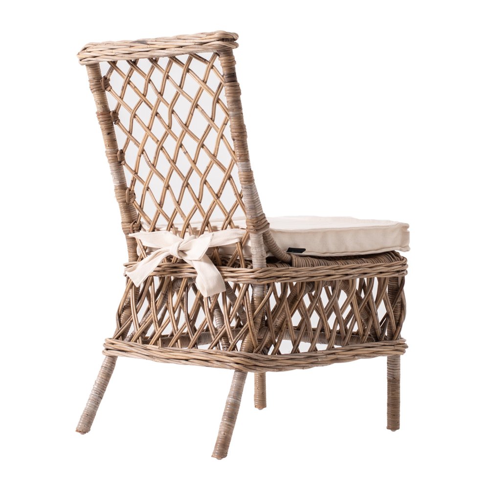Set of Two Cream Woven Rattan Outdoor Accent Chairs on a white background