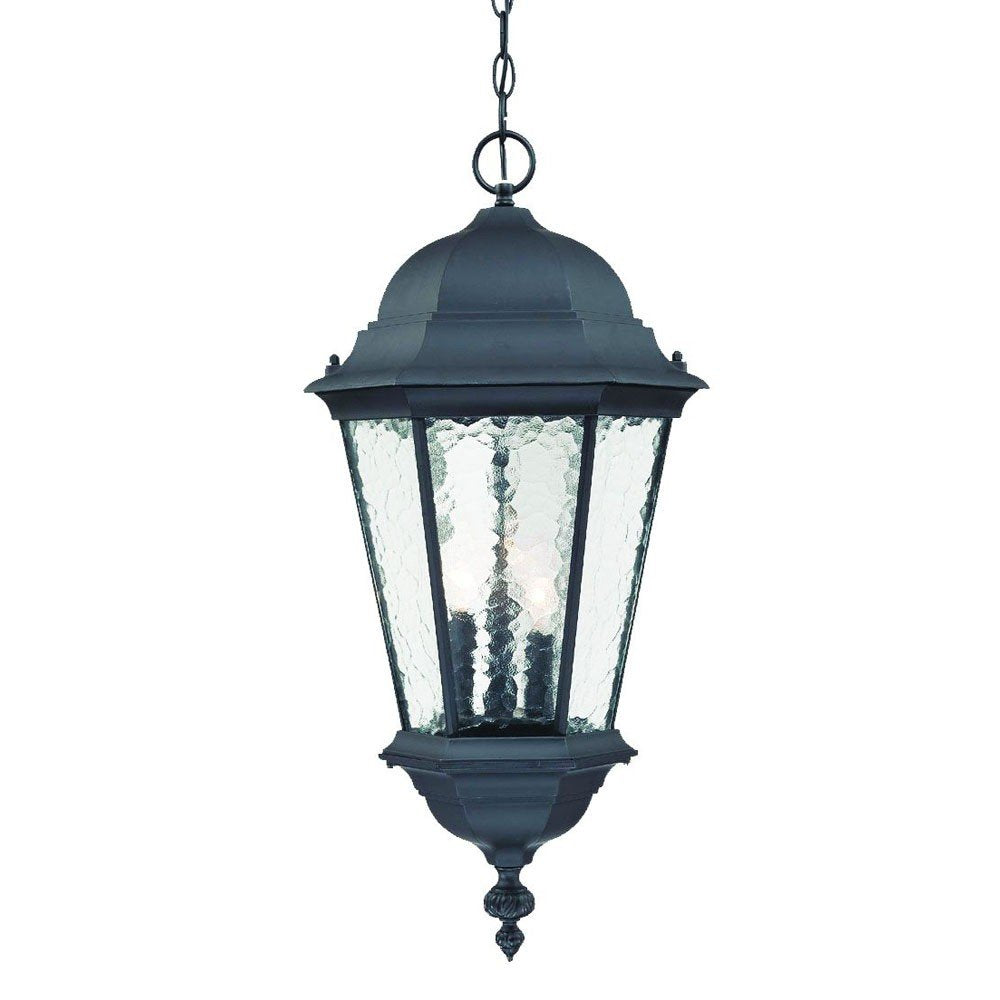 Matte black hanging lantern with textured glass panels and three visible bulbs, suspended by a chain against a white background.
