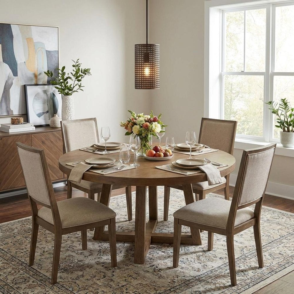 Bronze Metal Hanging Light with Mesh Shade in a home interior
