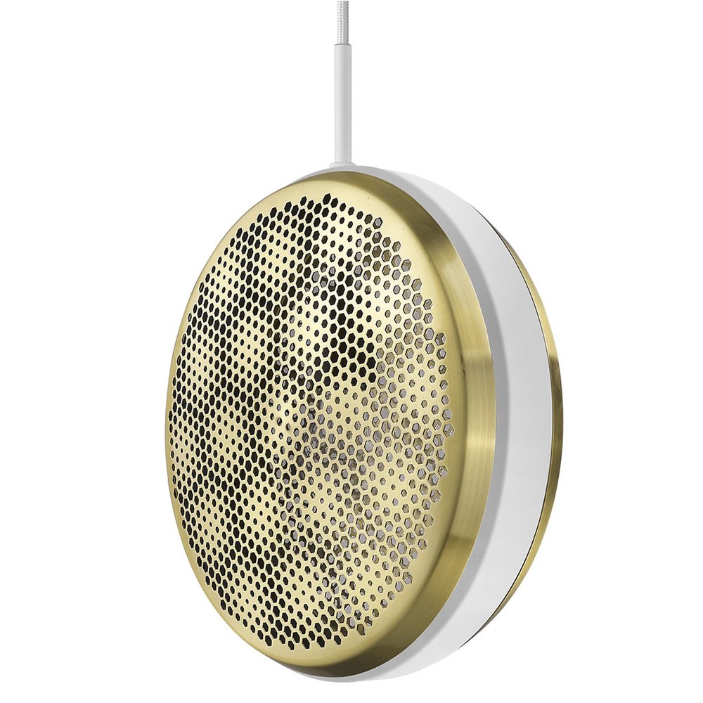 A white pendant light with a brass perforated shade hangs from a white cord against a white background.