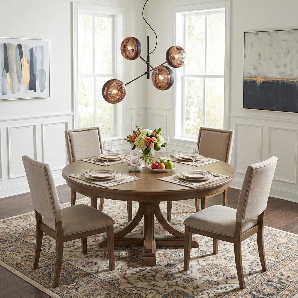 Tholos 4-Light Matte Black Pendant in a home interior