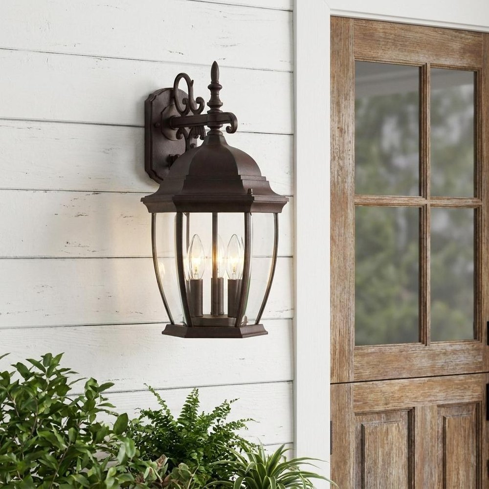Three Light Dark Brown Wide Hanging Lantern Wall Light in a home interior