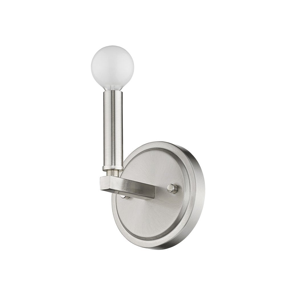 A silver metal wall sconce with a round backplate and a single exposed bulb on a vertical arm against a white background.