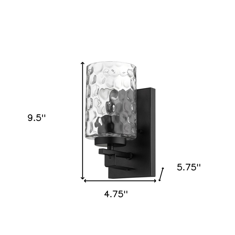 Black Metal and Pebbled Glass Wall Sconce on a white background