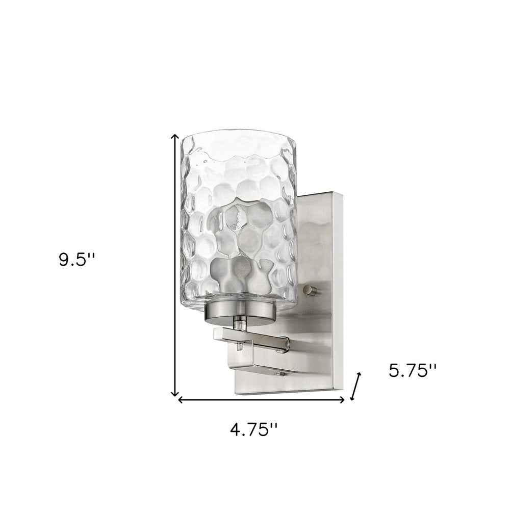 Silver Metal and Pebbled Glass Wall Sconce on a white background