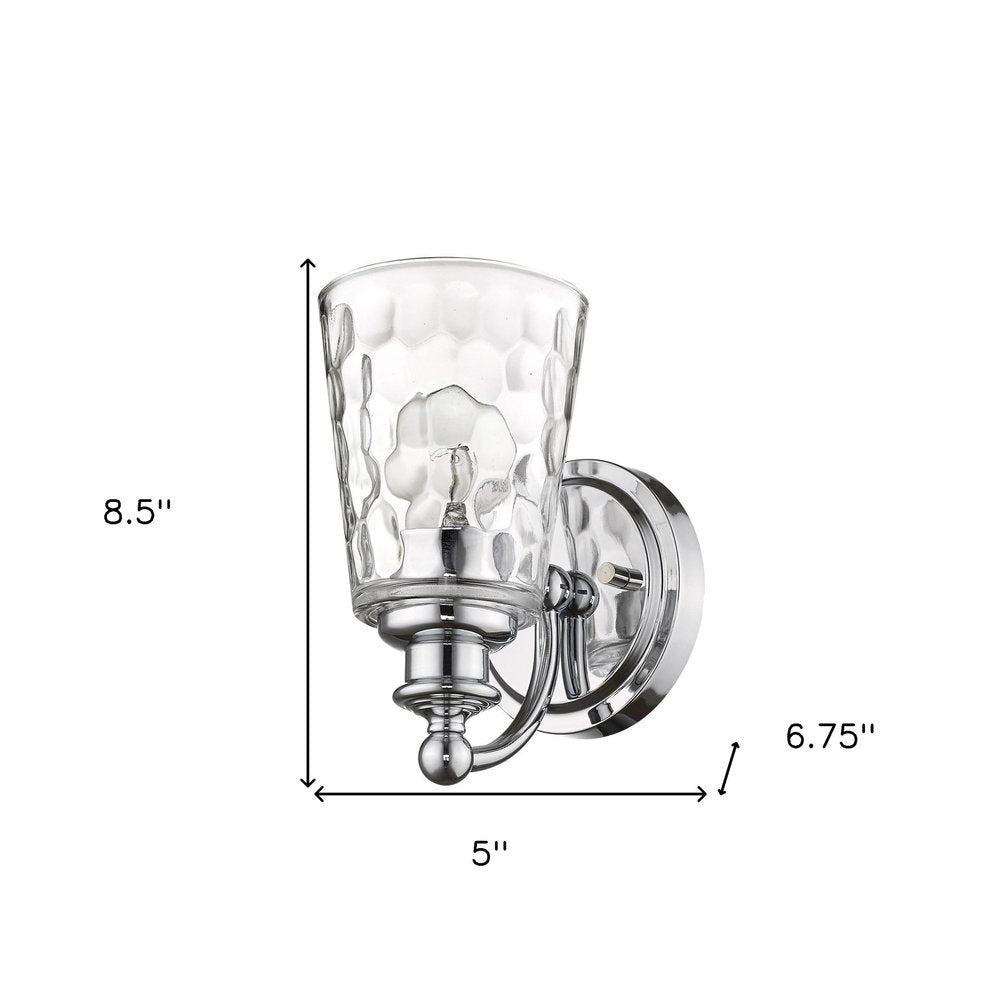 Silver Metal and Pebbled Glass Wall Light on a white background