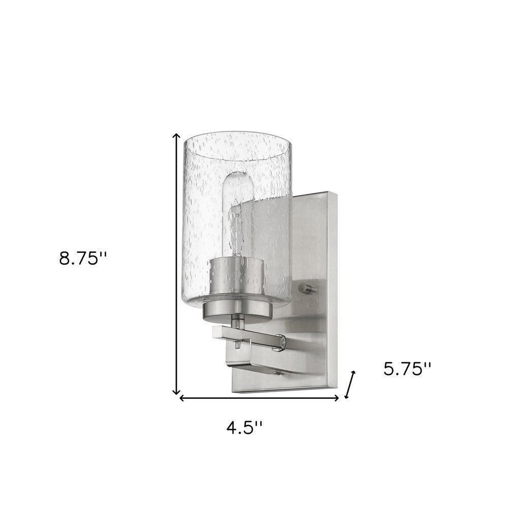 Silver Metal and Textured Glass Wall Sconce on a white background
