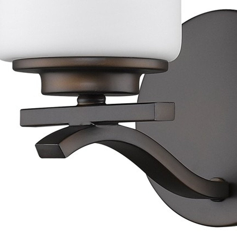 One Light Bronze and Glass Wall Sconce on a white background