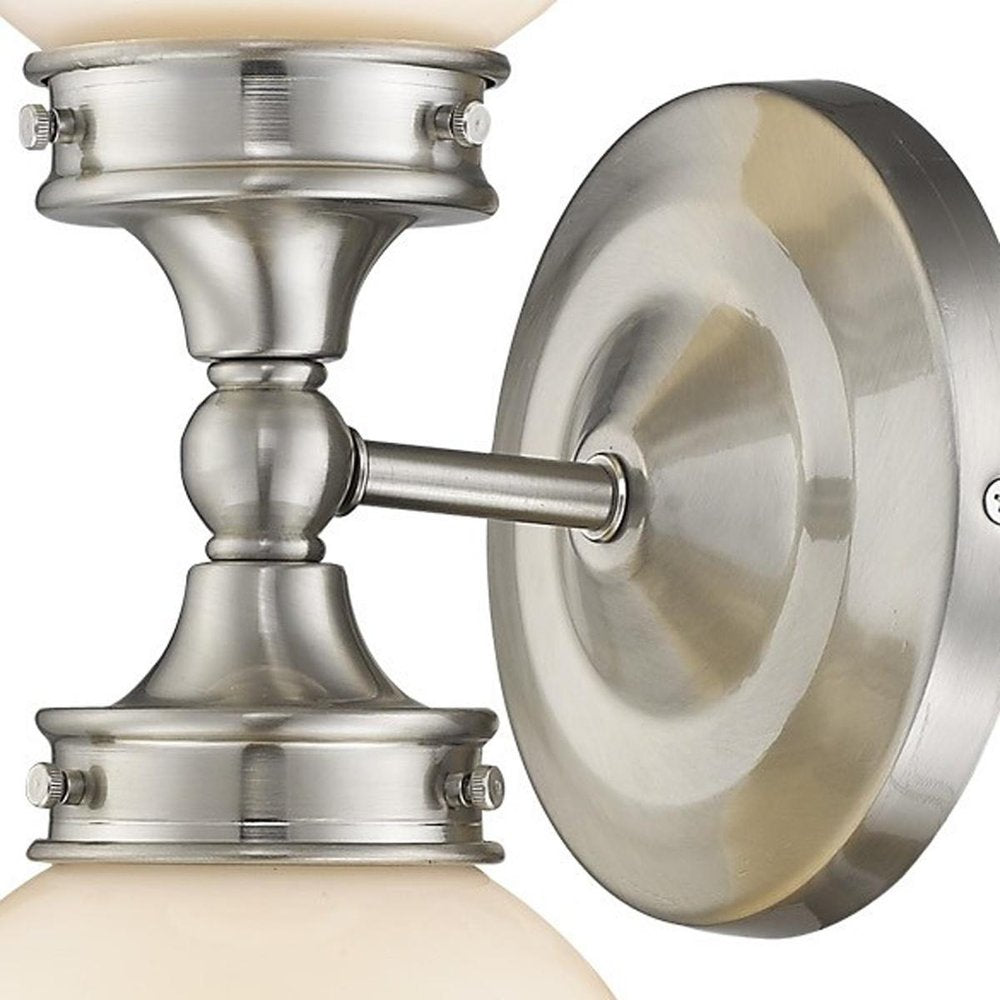 Two Light Silver Wall Sconce with Round Frosted Glass Shade on a white background