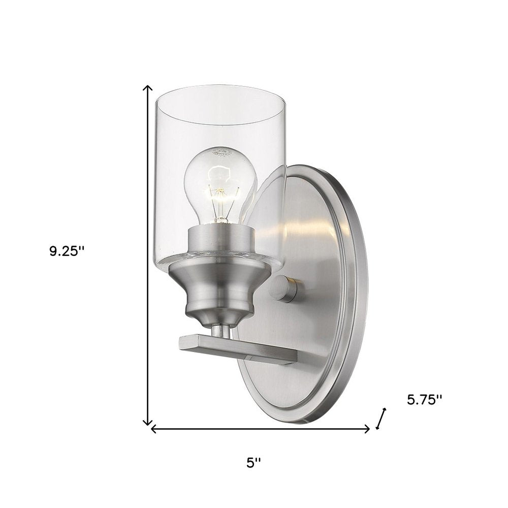 One Light Silver Wall Light with Clear Glass Shade on a white background