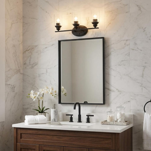 10" Black And Clear Metal and Glass Vanity Flush Mounted Sconce mounted on a tan wall in a furnished interior.