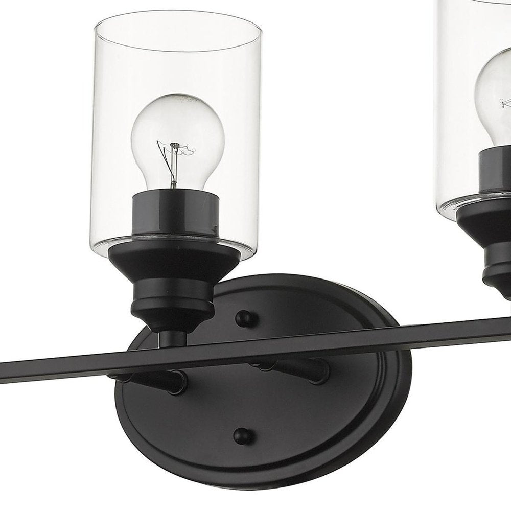 10" Black And Clear Metal and Glass Vanity Flush Mounted Sconce. Wall light isolated on a plain white background, in a black glass finish.