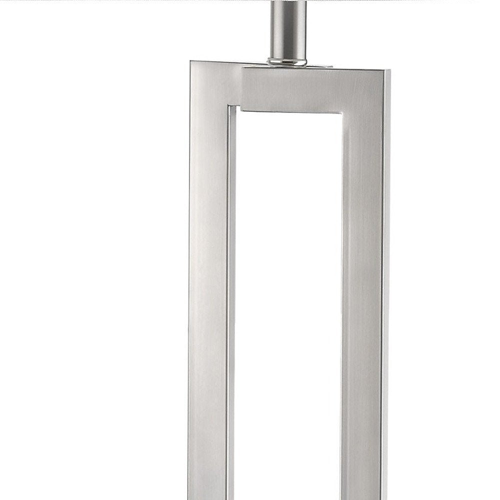 30" Silver Metal Table Lamp With White Rectangular Shade. Table lamp isolated on a plain white background, in a silver metal finish.