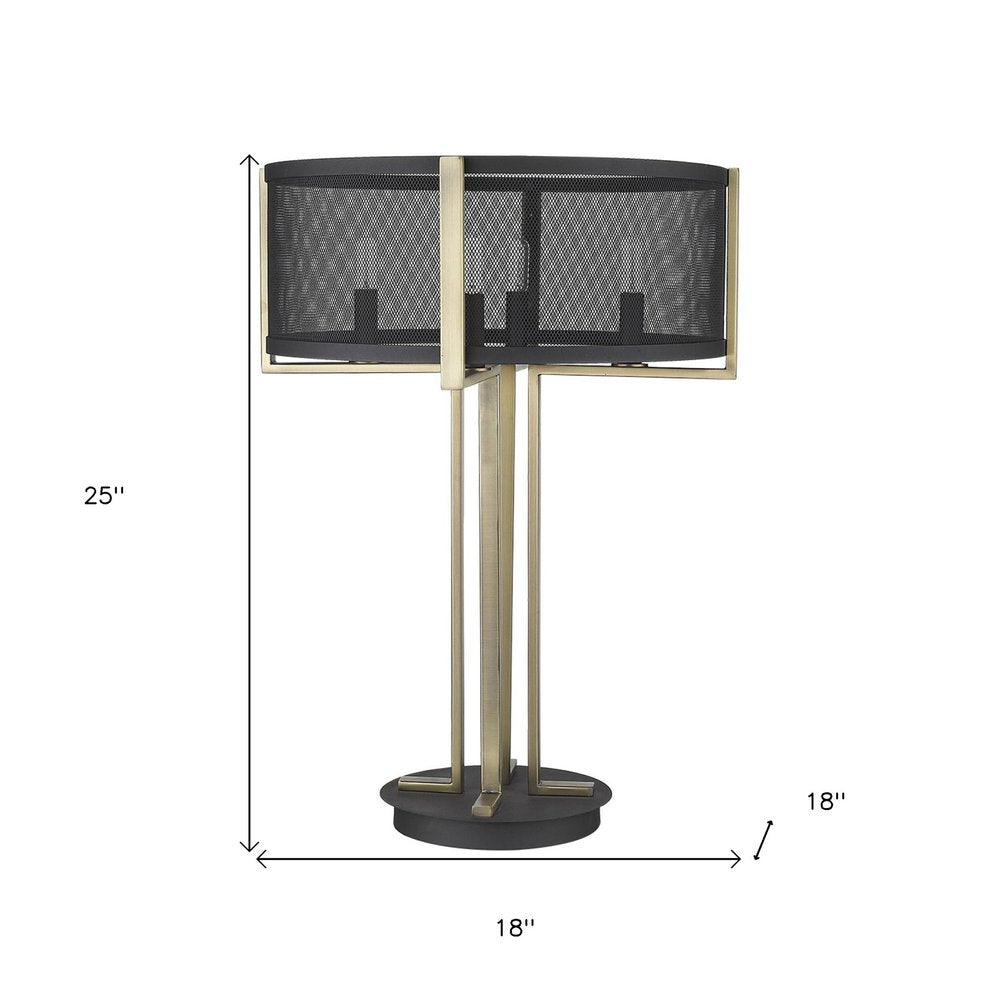 25" Brass Metal Four Light Geometric Table Lamp With Black Drum Shade. Table lamp isolated on a plain white background, in a black metal finish.