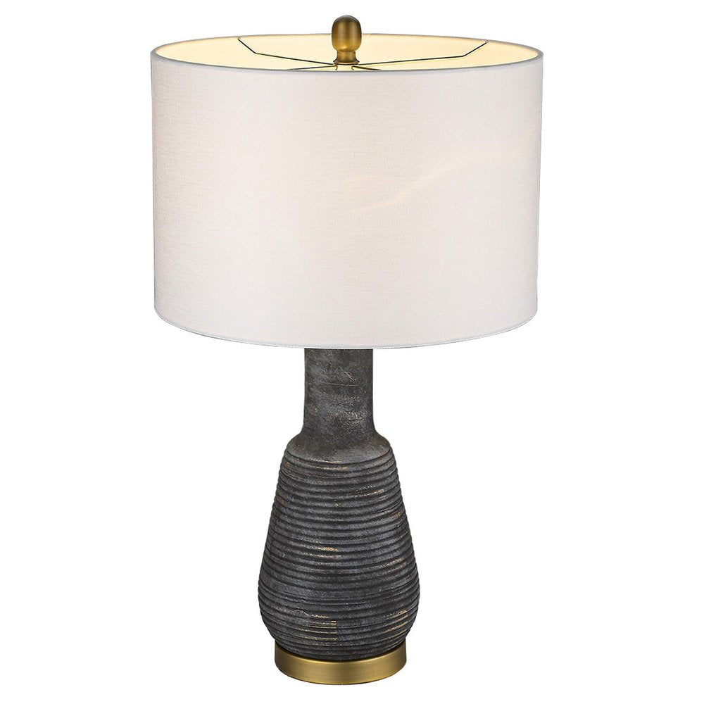 26" Distressed Black and Gold Ceramic Table Lamp With White Drum Shade. Table lamp isolated on a plain white background, finished in black ceramic.