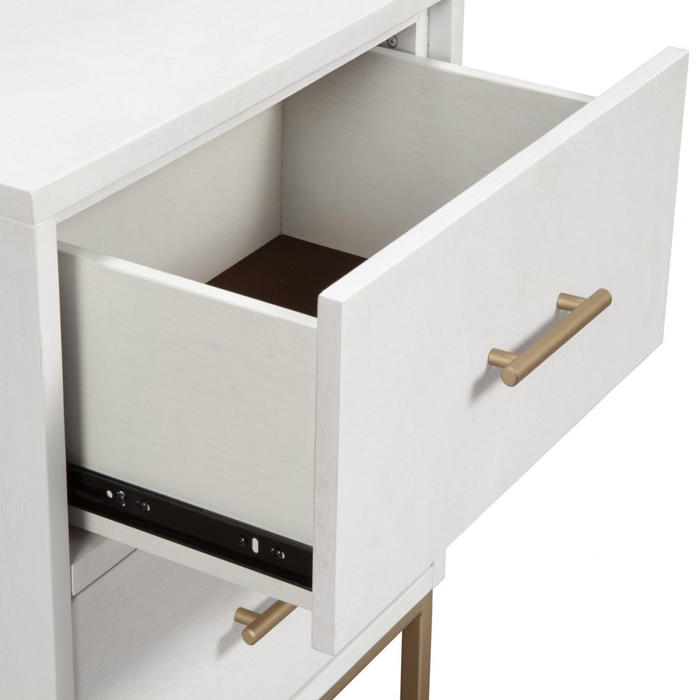 26" White And Gold Wood And Metal Two Drawer Nightstand. Nightstands & bedside table isolated on a plain white background, finished in white metal.