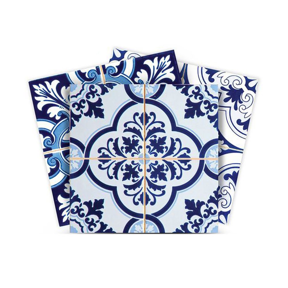 Four blue and white patterned peel and stick tiles arranged in a fan shape on a white background.