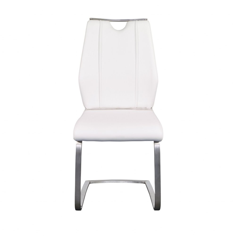 White upholstered leather dining chair with silver metal legs on a white background.