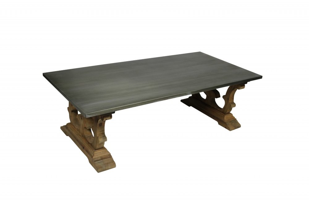 63" Gray and Brown Zinc and Solid Wood Pedestal Coffee Table. Coffee table isolated on a plain white background, in a gray wood finish.