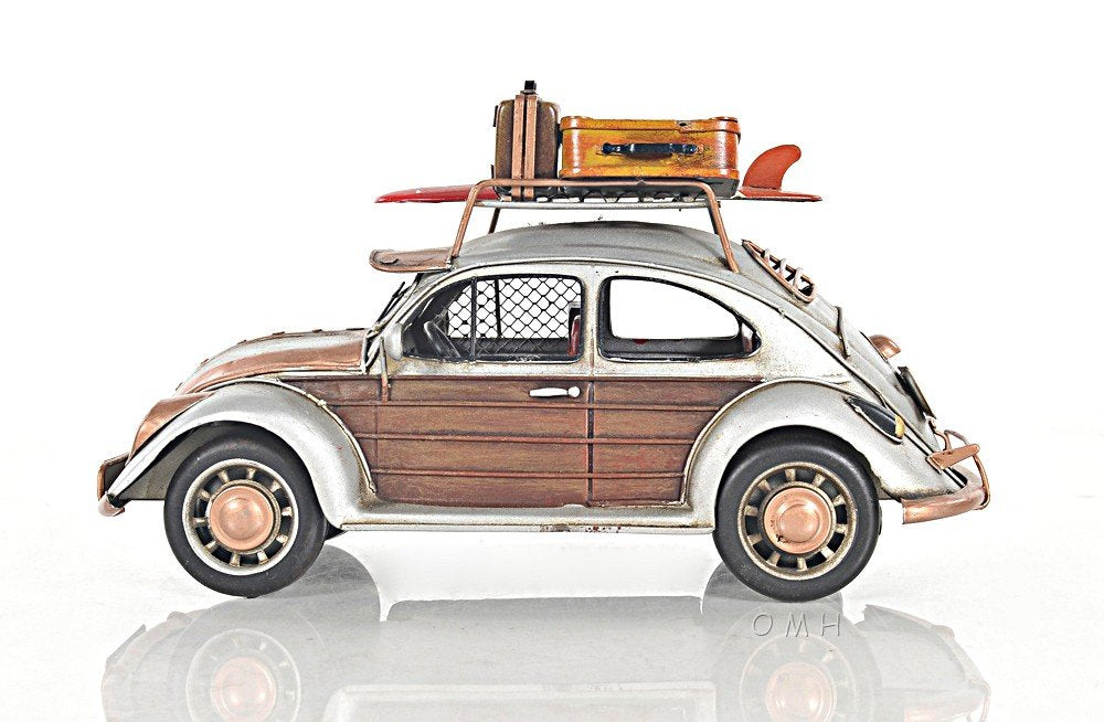 7" Silver Metal Hand Painted Model Car Tabletop Sculpture on a white background