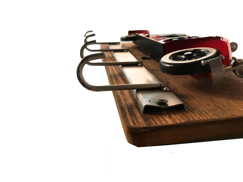 c1934 Duesenberg Model J Coat Rack on a white background