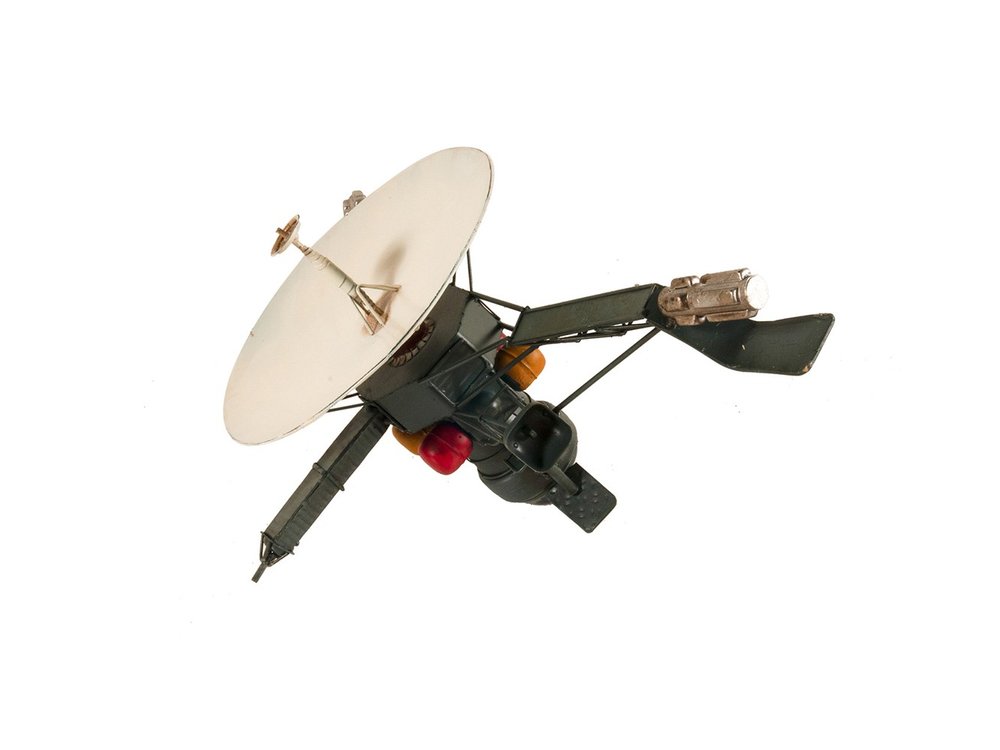 11" Dark Green Metal Hand Painted Model Airplane Tabletop Sculpture. Sculpture isolated on a plain white background, showing a metal surface.