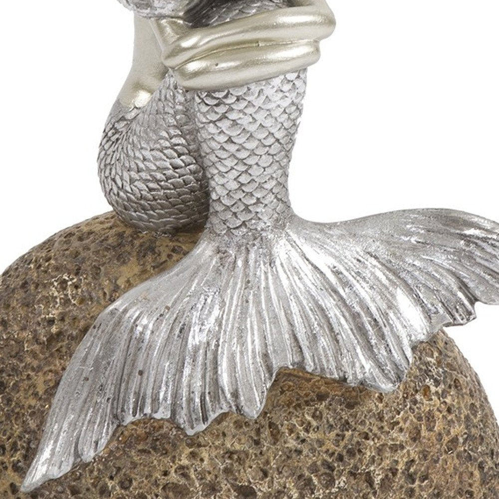 10" Brown and Silver Contemplative Mermaid Resin Tabletop Sculpture. Sculpture in silver resin.