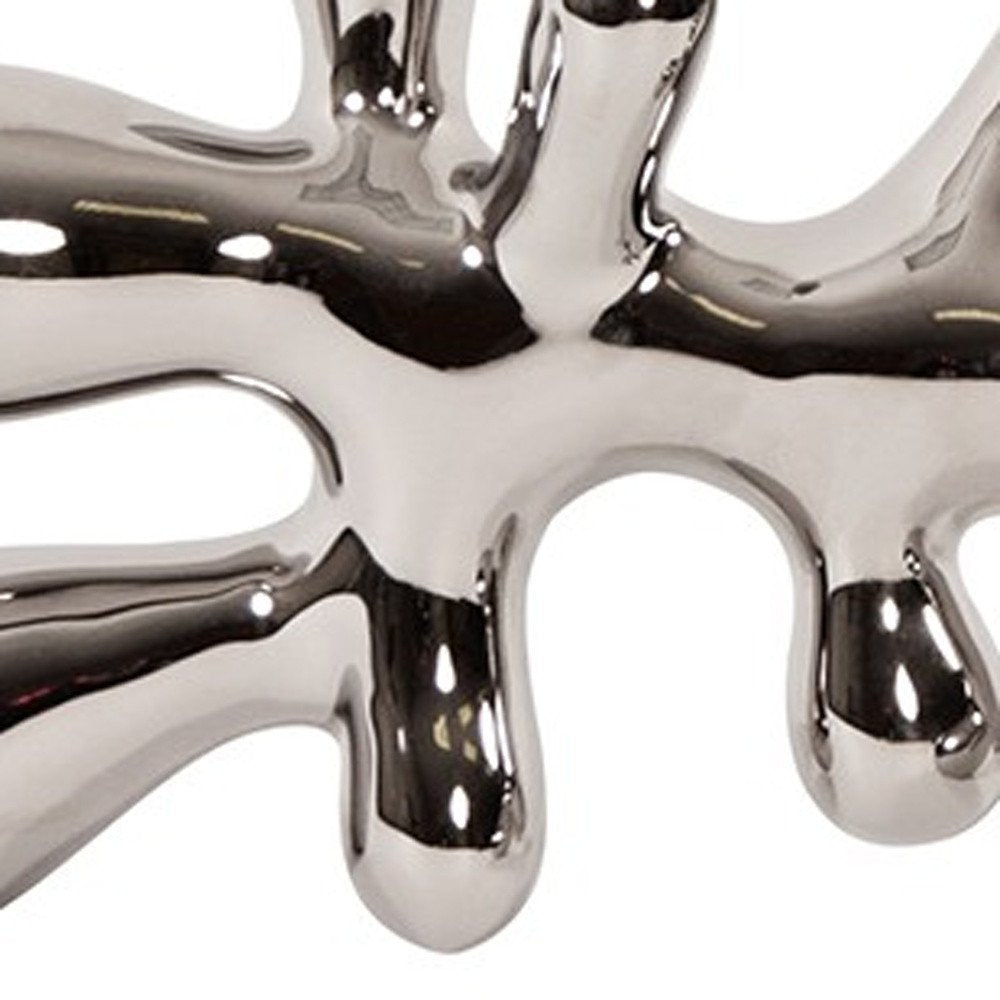 7" Silver Metal Tabletop Sculpture on a white background