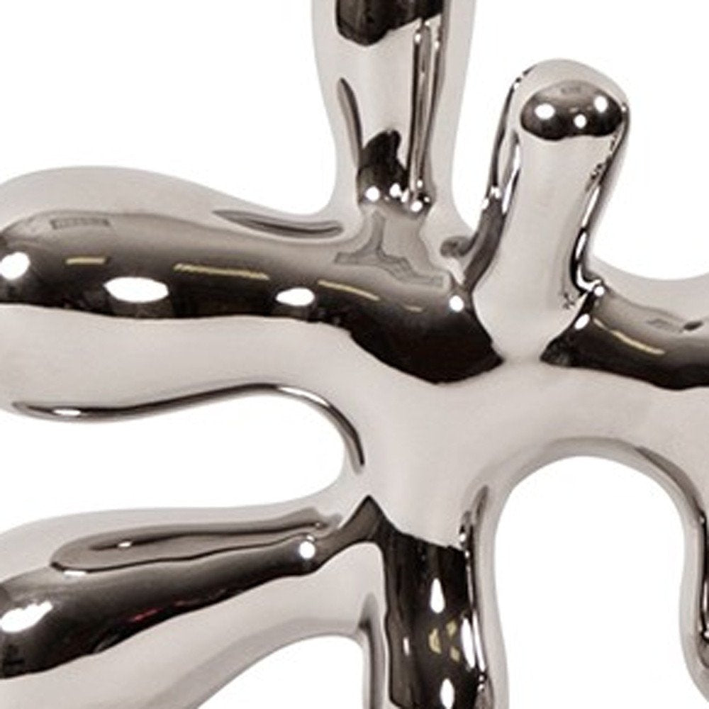 7" Silver Metal Tabletop Sculpture on a white background