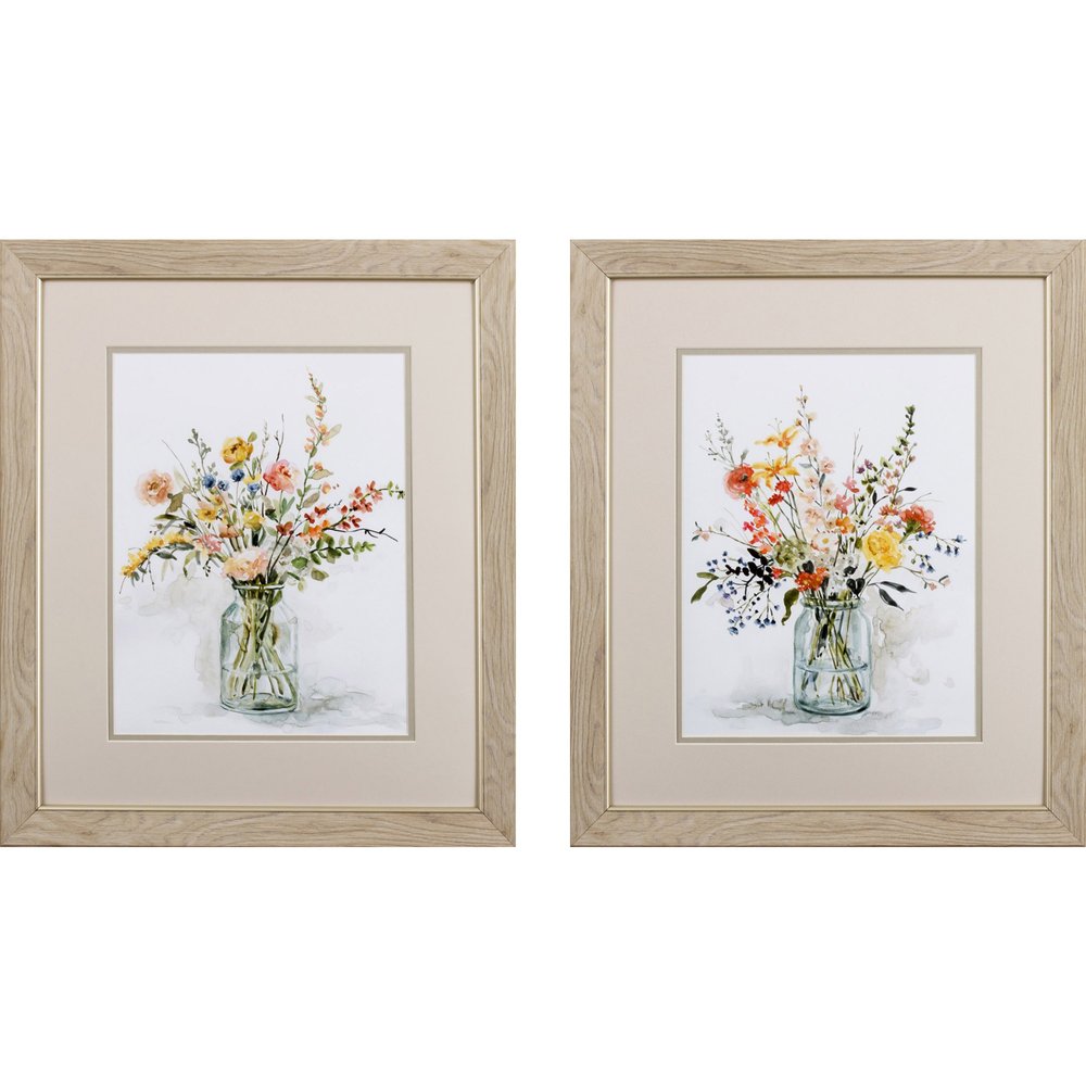 Set of two framed watercolor paintings of colorful floral bouquets in glass vases with light wood frames.