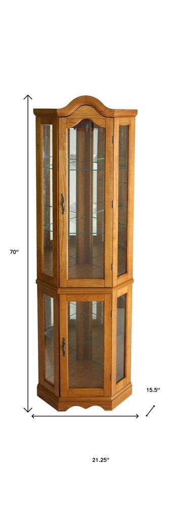 Golden Oak Scallop Top Lighted Corner Curio Cabinet on a white background