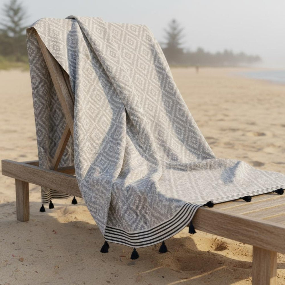 Gray Tribal Design Turkish Towel Beach Blanket in a home interior