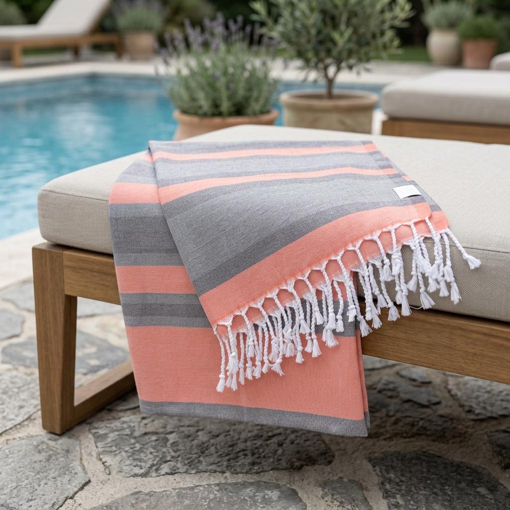 Peach and Dark Grey Striped Design Turkish Beach Blanket in a home interior