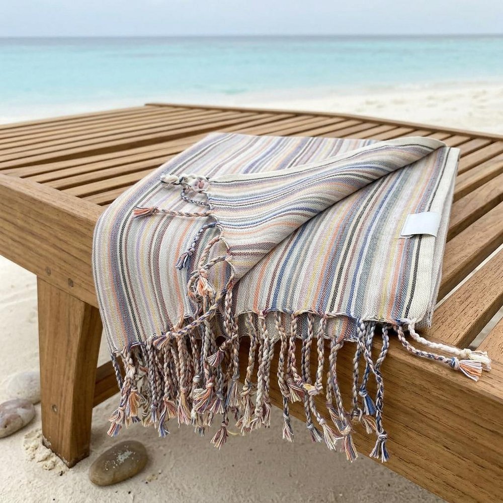 Multi Colored Striped Design Turkish Beach Blanket in a home interior