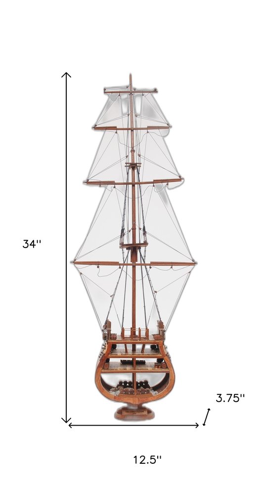34" Brown Boat Model Sculpture. Sculpture isolated on a plain white background, showing its brown color.